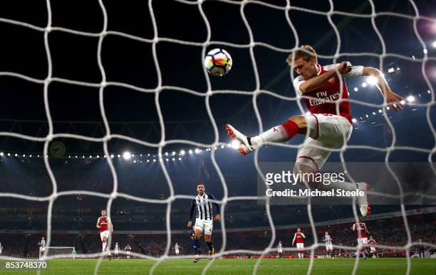 Nacho Monreal of Arsenal clears the ball from the goal line during the Premier League match between Arsenal and West Bromwich Albion at Emirates...