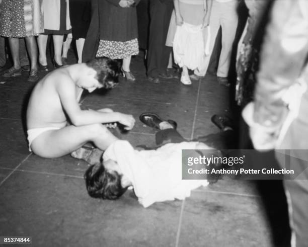 Two victims, one stripped, one badly beaten, of a gang of servicemen at a cinema in Los Angeles, California, during the Zoot Suit Riots, 7th June...