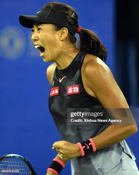 Sept. 25, 2017 : China's Zhang Shuai celebrates during the singles first round match against Donna Vekic of Croatia at 2017 WTA Wuhan Open in Wuhan,...