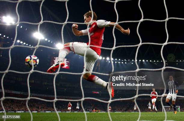 Nacho Monreal of Arsenal clears the ball from the goal line during the Premier League match between Arsenal and West Bromwich Albion at Emirates...