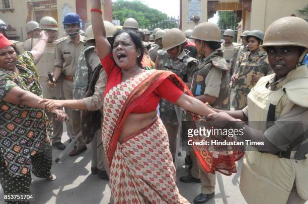 Samajwadi Party workers protest at BHU gate against the lathicharge on students, on September 25, 2017 in Varanasi, India. Several students, mostly...