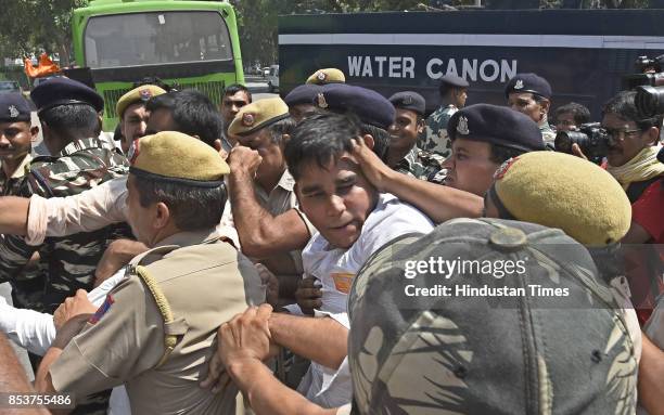 Akhil Bharatiya Vidyarthi Parishad activists protest against the lathicharge in BHU campus at HRD Ministry, Shastri Bhawan on September 25, 2017 in...