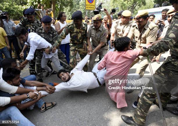 Akhil Bharatiya Vidyarthi Parishad activists protest against the lathicharge in BHU campus at HRD Ministry, Shastri Bhawan on September 25, 2017 in...