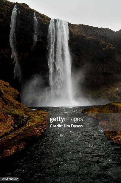 The 60 metre high Seljalandsfoss waterfall cascades down a mountain on February 20, 2009 in the south of Iceland. A country of glacial and volcanic...