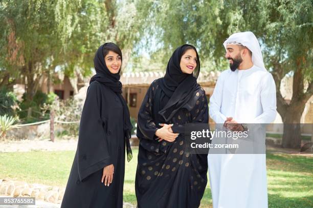 young arabs in traditional clothing - tradition stock pictures, royalty-free photos & images