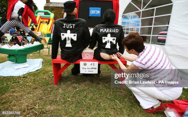 Last minute alterations are made to Kimye HoneMOONING in Laois scarecrows, during the Durrow Scarecrow Festival in Ireland, as Kanye West and Kim...