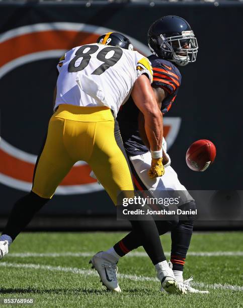 Vance McDonald of the Pittsburgh Steelers strips Marcus Cooper of the Chicago Bears of the ball at the goal lline at Soldier Field on September 24,...
