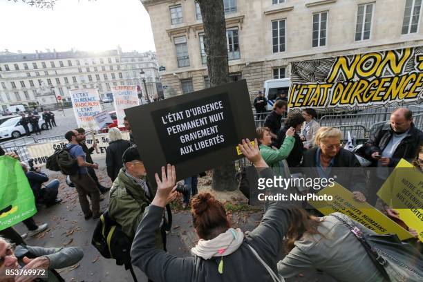 Protesters rally to protest against 'permanent state of emergency' in Paris on September 25 in front of the French National Assembly. The French...