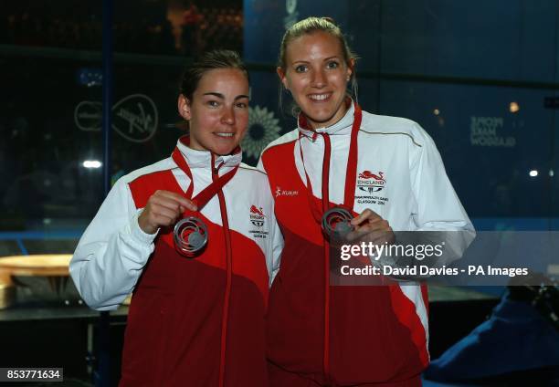 England's Jenny Duncalf and Laura Massaro celebrate their Silver medal in the Women's Doubles Squash at Scotstoun Sports Campus, during the 2014...