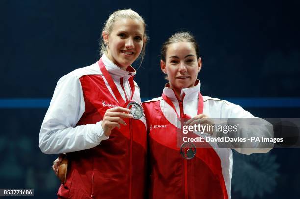 England's Jenny Duncalf and Laura Massaro celebrate their Silver medal in the Women's Doubles Squash at Scotstoun Sports Campus, during the 2014...