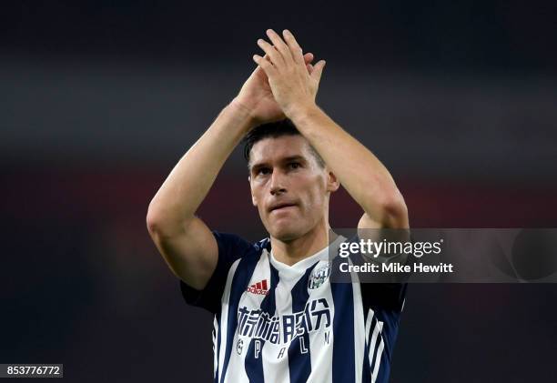 Gareth Barry of West Bromwich Albion applauds the crowd after his record 633rd Premier League appearance following the Premier League match between...