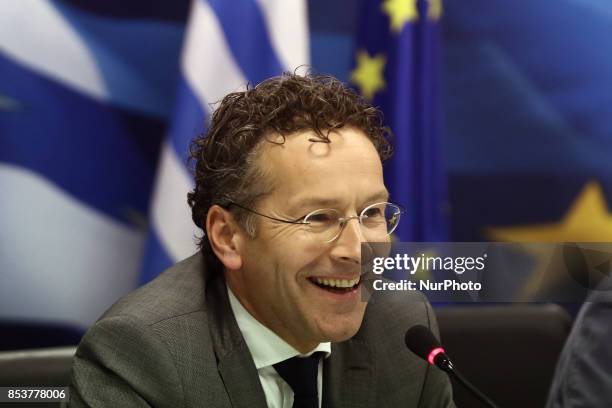 Eurogroup chief Jeroen Dijsselbloem smiles during joint press conference with Greek Fin. Minister, at the Finance Ministry, after their meeting , in...