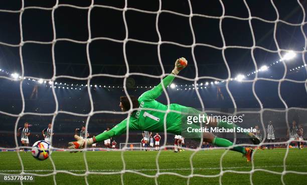 Alexandre Lacazette of Arsenal scores their second goal from a penalty past Ben Foster of West Bromwich Albion during the Premier League match...