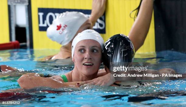 Wales' Jazz Carlin hugs New Zealand's Lauren Boyle after finishing second in the Women's 400m Freestyle Final, at Tollcross International Swimming...