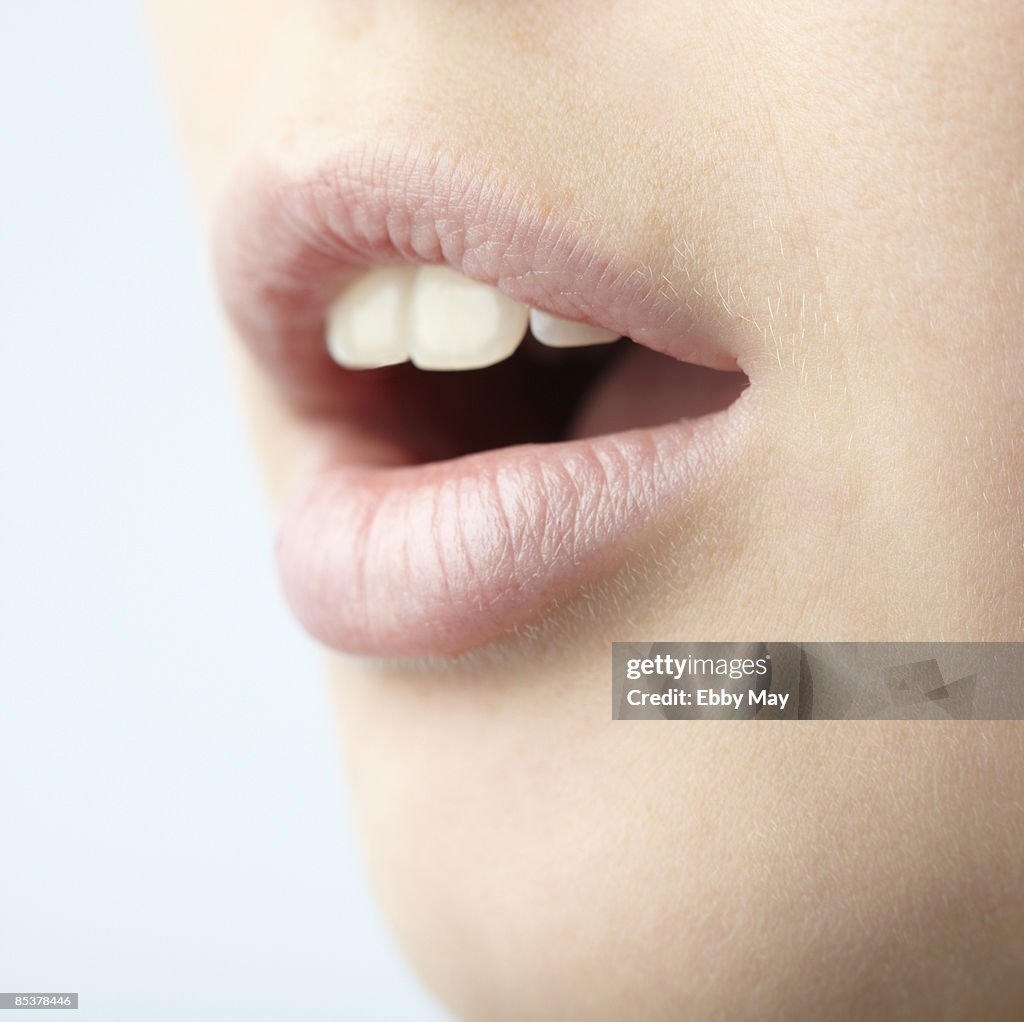 Mouth of young woman, close-up