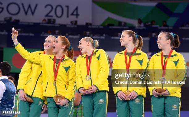 Silver medal winners Australia's Larrissa Miller, Olivia Vivian, Georgia Rose Brown, Lauren Mitchell and Mary Anne Monckton take a selfie on the...