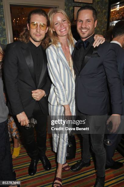 Caroline Winberg poses with CDLP co-founders Christian Larson and Andreas Palm at the CDLP Crayfish Party at Mark's Club on September 25, 2017 in...