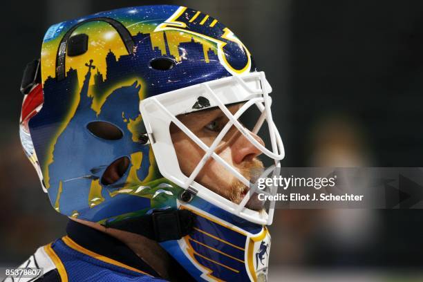 Goaltender Chris Mason of the St. Louis Blues takes a break during warmups prior to the game against the Florida Panthers at the Bank Atlantic Center...