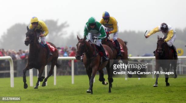 Cacheofgold ridden by Johnny Burke wins The Download The Tote Mobile App European Breeders Fund Mares Handicap Hurdle on day three of the Galway...