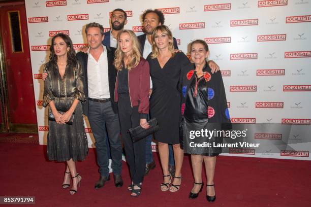 Ramzy Bedia, Amelle Chahbi, Guillaume de Tonquedec, Audrey Lamy, Mathilde Seigner, guest and Fabrice Eboue attend "Coexister" Paris Premiere at Le...