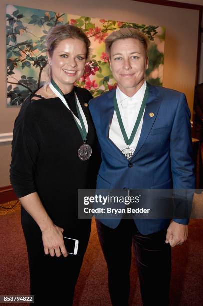 Honorees Kim Clijsters and Abby Wambach attend the 32nd Annual Great Sports Legends Dinner To Benefit The Miami Project/Buoniconti Fund To Cure...