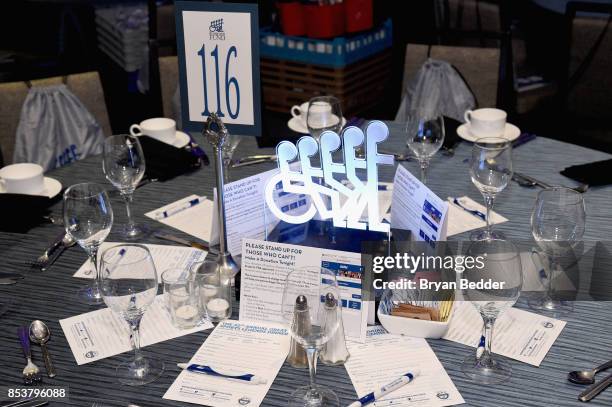 View of the table settings during the 32nd Annual Great Sports Legends Dinner To Benefit The Miami Project/Buoniconti Fund To Cure Paralysis Legends...