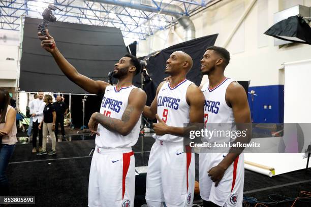 LaDonte Henton, C.J. Wilson and Tyron Wallace of the Los Angeles Clippers take a photo during media day at the Los Angeles Clippers Training Center...