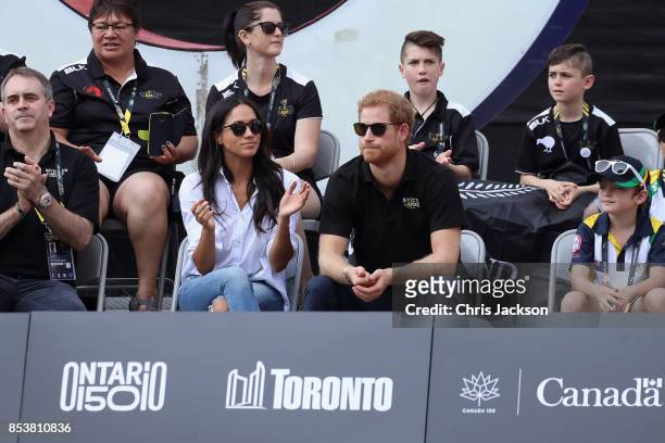 Prince Harry and Meghan Markle attend a Wheelchair Tennis match during the Invictus Games 2017 at Nathan Philips Square on September 25, 2017 in...
