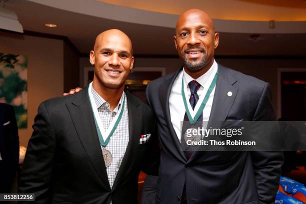 Honorees Jason Taylor and Alonzo Mourning attend the 32nd Annual Great Sports Legends Dinner To Benefit The Miami Project/Buoniconti Fund To Cure...