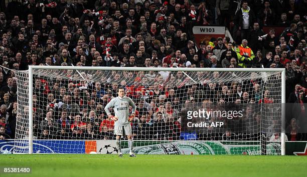 Inter Milan's Brazilian goalkeeper Julio Cesar looks up after conceeding to Manchester United's Portuguese midfielder Cristiano Ronaldo during their...