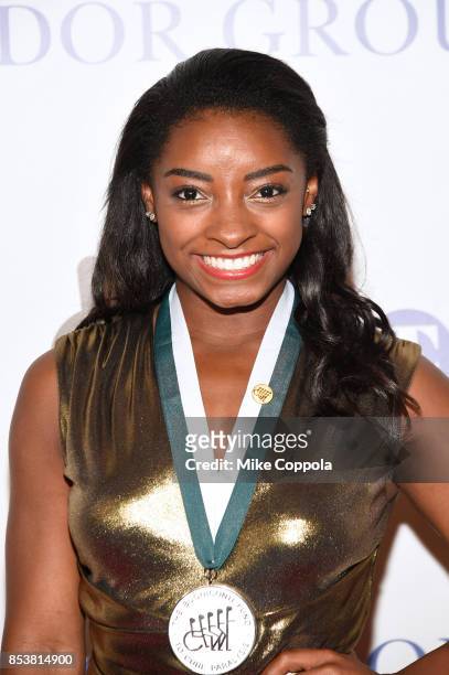 Honoree Simone Biles attends the 32nd Annual Great Sports Legends Dinner To Benefit The Miami Project/Buoniconti Fund To Cure Paralysis at New York...