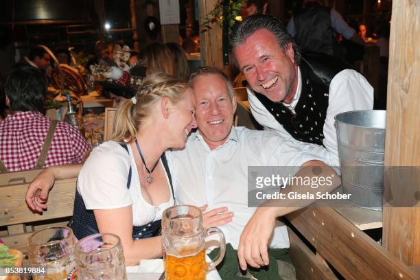 Johannes B. Kerner and his sister Julia and Thomas Schreiner, CEO Laurent-Perrier Champagner during the Oktoberfest at Kaeferzelt at Theresienwiese...