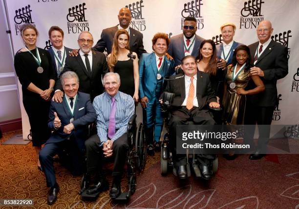 Honorees and Hosts pose at the 32nd Annual Great Sports Legends Dinner To Benefit The Miami Project/Buoniconti Fund To Cure Paralysis at New York...