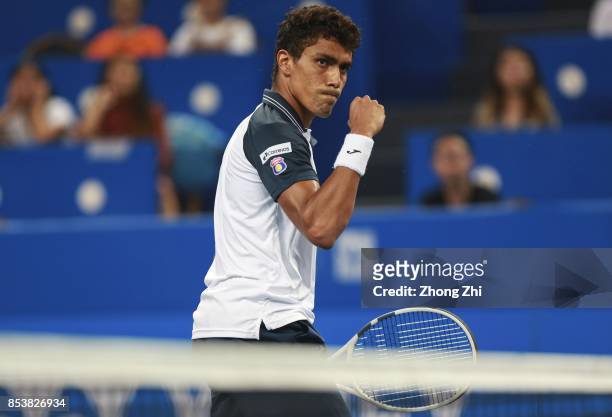 Thiago Monteiro of Brazil celebrates a point during the match against Yibing Wu of China during Day 1 of 2017 ATP Chengdu Open at Sichuan...