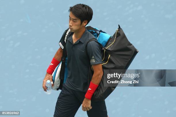 Yuichi Sugita of Japan looks on after the match against Mate Pavic of Croatia during Day 1 of 2017 ATP Chengdu Open at Sichuan International Tennis...