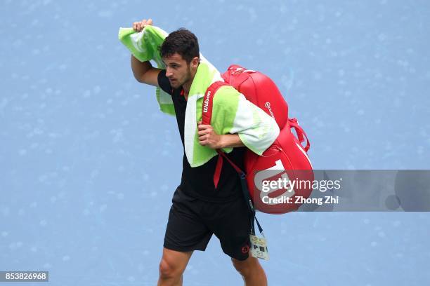 Mate Pavic of Croatia looks on after the match against Yuichi Sugita of Japan during Day 1 of 2017 ATP Chengdu Open at Sichuan International Tennis...