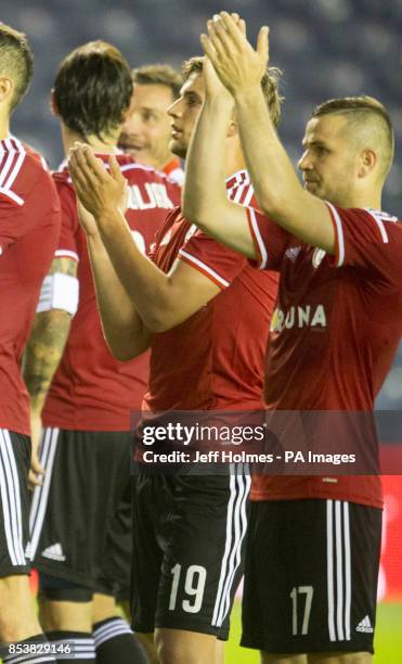 Legia Warsaw's Bartosz Bereszynski applauds the fans after the final whistle of the Champions League Qualifying at Murrayfield, Edinburgh.