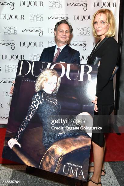 Jason Binn and Uma Thurman attend the celebration of DuJour's fall cover star Uma Thurman at The Magic Hour at Moxy Times Square on September 25,...
