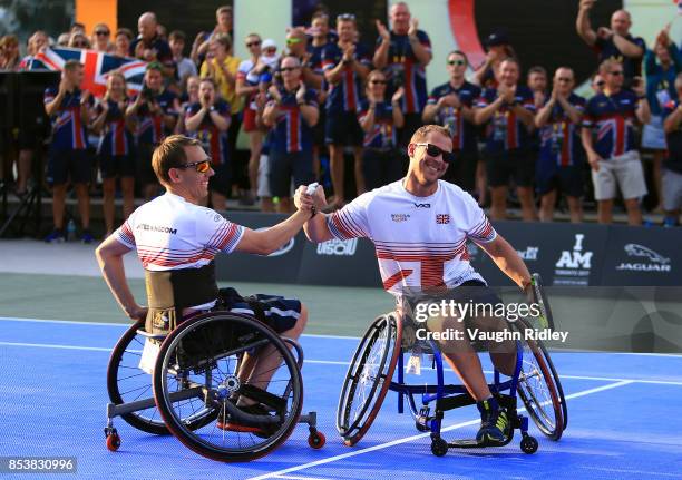 Alexander Krol and Kevin Drake of the United Kingdom celebrate victory in the Wheelchair Tennis Gold medal match against Glenn Barnes and Aaron Gibbs...