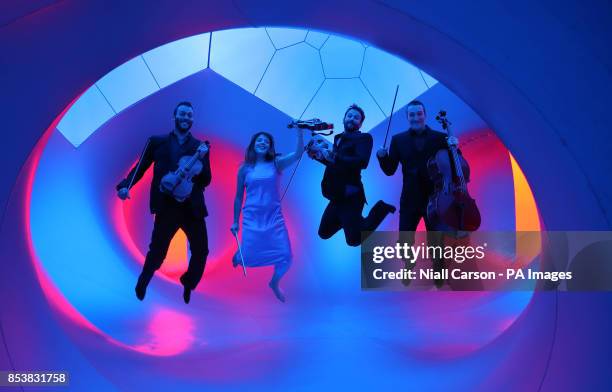 The Heath Quartet Gary Pomeroy Cerys Jones Oliver Heath Christopher Murray take part in a photocall in a Luminarium at Kilkenny Castle at the opening...