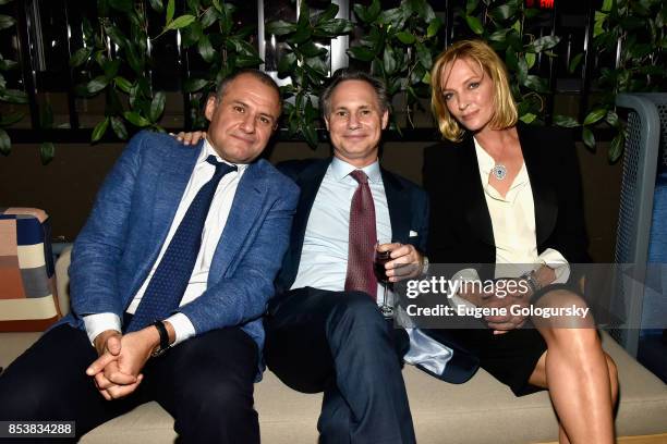 Ronn Torossian, Jason Binn and Uma Thurman attend the celebration of DuJour's fall cover star Uma Thurman at The Magic Hour at Moxy Times Square on...