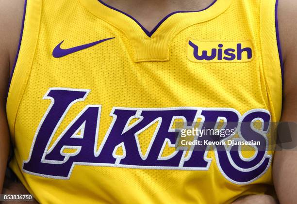 The new Los Angeles Lakers Nike jersey with the sponsor logo "Wish" on the left chest is seen during media day September 25 in El Segundo,...