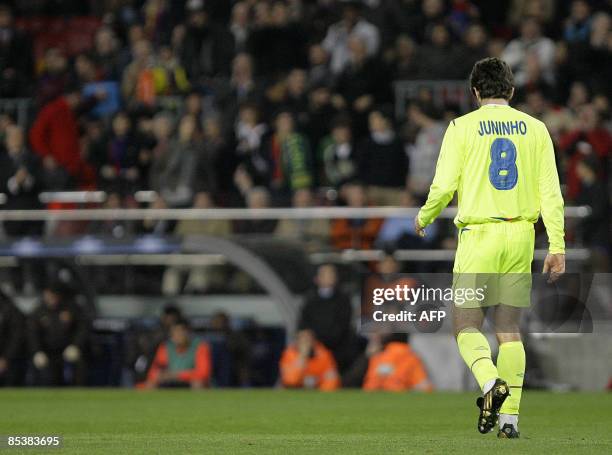 Lyon's Brazilian midfielder Pernambucano Juninho is sent off during the UEFA Cup Champions League football match against Barcelona at the Camp Nou...