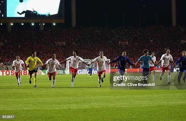 South Korea celebrate their 1-0 win after the FIFA World Cup Finals 2002 Group D match between Portugal and South Korea played at the Incheon Munhak...