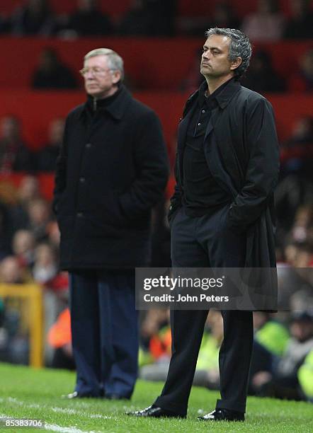 Sir Alex Ferguson of Manchester United and Jose Mourinho of Inter Milan watch from the touchline during the UEFA Champions League First Knockout...