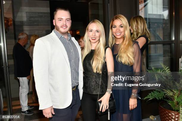 Michael Snell, Sabine Brown and Araceli Franco attend the celebration of DuJour's fall cover star Uma Thurman at The Magic Hour at Moxy Times Square...
