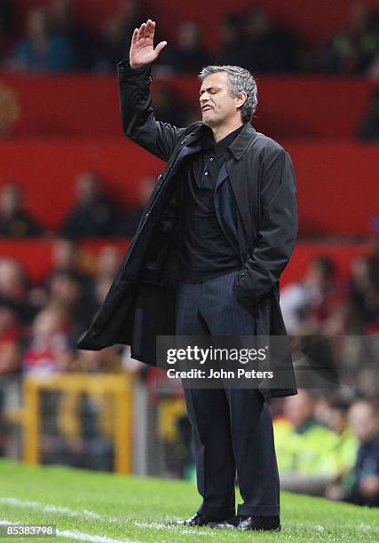 Jose Mourinho of Inter Milan watches from the touchline during the UEFA Champions League First Knockout Round Second Leg match between Manchester...