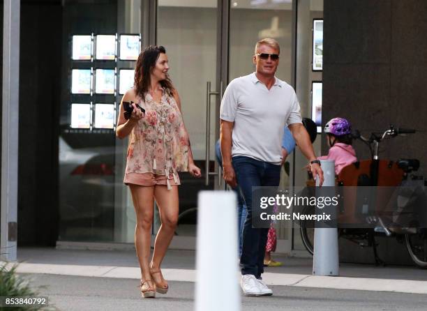 Actor Dolph Lundgren and Jenny Sandersson walk around Broadbeach on the Gold Coast, Queensland. Dolph Lundgren is currently filming Aquaman.