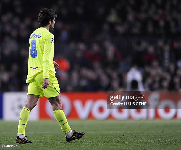 Lyon's Brazilian midfielder Pernambucano Juninho leaves the field receiving a red card during the Champions League football match against Barcelona...