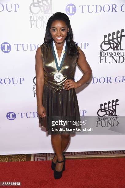 Event honoree, four-time Gold Medalist Simone Biles attends the 32nd Annual Great Sports Legends Dinner at New York Hilton Midtown on September 25,...